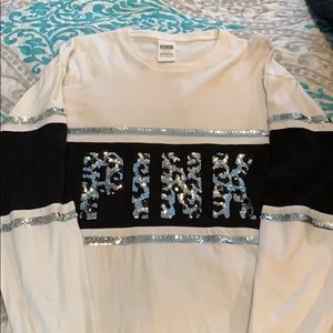 White and black sparkly pink long sleeve shirt